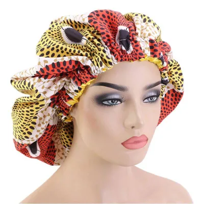 Bonnet de nuit en satin imprimé wax/jaune